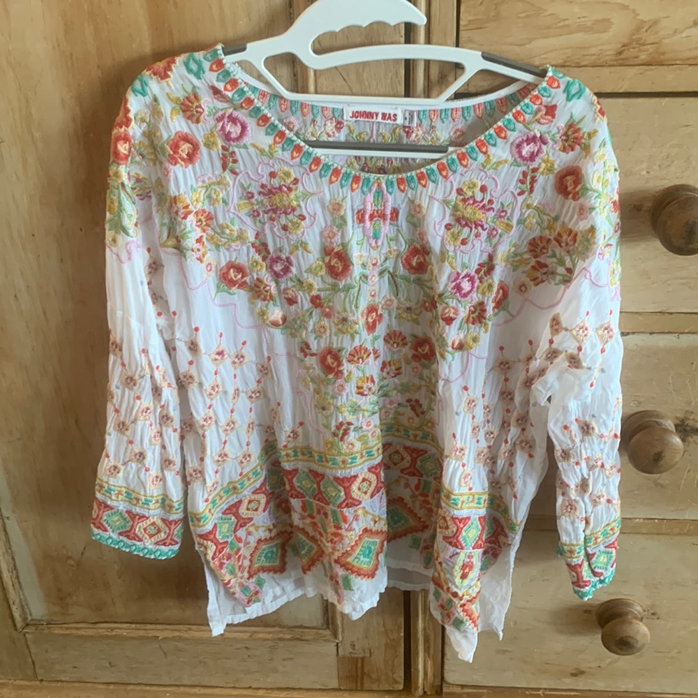 Johnny was white shirt. Sheer white, beautiful embroidery